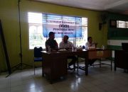 Babinsa Koramil Wotu Hadiri Sosialisasi MMD bersama Puskesmas Wotu di Desa Arolipu
