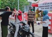 Lindungi Warganya dari Covid-19, Pemdes Nyiur Indah Bagikan Masker Secara Gratis