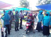 Libatkan Babinsa Koramil Wotu, TP-PKK Luwu Timur Bagikan Masker di Pasar Lambarese
