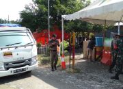 Personil Koramil Mangkutana Laksanakan Penjagaan Posko Covid-19 Batas di Kasintuwu