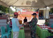 Babinsa Imbau Pakai Masker saat Melintas di Posko Siaga Covid-19 Desa Manggala Luwu Timur