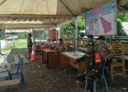 Pantau Wilayah Perbatasan, Personil Koramil Wotu Jaga Posko Covid-19