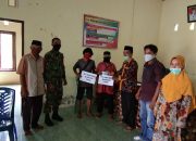 Babinsa Koramil Wotu Dampingi Pemdes Batu Putih SaLurkan BLT