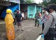 Kapolsek Galut Dampingi TGC Takalar Jemput Pasien Positif Covid-19 di Galut