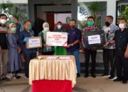 BNI Cabang Mattoanging Sumbang APD dan Masker Medis ke Pemkab Takalar