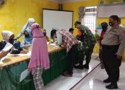 Bhabinkamtibmas Desa Tamasaju Lakukan Pengamanan Pembagian BLT Tahap II