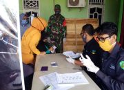 Babinsa Koramil 1403-13 Wotu Dampingi Pembagian BST Kemensos RI Tahap II di Desa Bawalipu Lutim