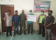 Babinsa Koramil 1403-13 Wotu Kawal Pembagian BLT DD Tahap II di Desa Batu Putih Lutim