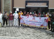 Peduli dengan Covid-19, Personil Koramil 13 Wotu Gelar Penyemprotan di Burau Lutim