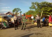 Sinergits TNI-Polri Himbau Pengunjung Pasar Jonggoa Desa Cikoang Cegah Covid 19