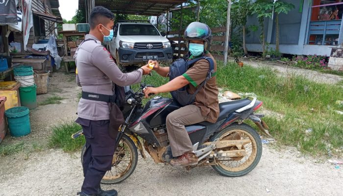 Polsek Belitang Imbau Warga Patuhi Protokol Kesehatan Saat Beraktivitas