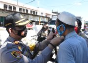 Kapolres Tolitoli Pimpin Operasi Yustisi Bagi 2.000 Masker di Tiga Pasar.
