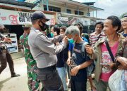 Warga Tak Pakai Masker Kena Sanksi Nyanyi Lagu Indonesia Raya
