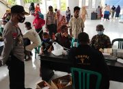 Polres Buol Buka Layanan Pengobatan Gratis Bagi Warga Terdampak Banjir di Kecamatan Momunu
