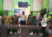 Sinergitas Tni-Polri Kawal Penyaluran Dana BLT di Desa Bukaan
