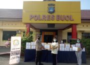 Jum’at Berkah, Bhayangkari Cabang Buol Serahkan Bantuan Sembako Kepada Warga