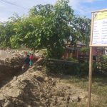 Papan Proyek Pekerjaan Drainase di Lambunu Parimo Sudah Terpasang 