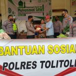 Dampak Banjir Mengepung Kabupaten Tolitoli, Kapolres Bersama Anggotanya Turun Langsung Membantu Masyarakat